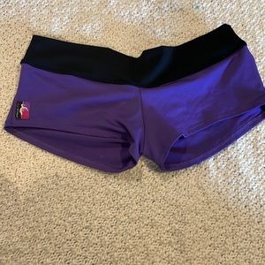 Pole fit by bad kitty purple and black shorts